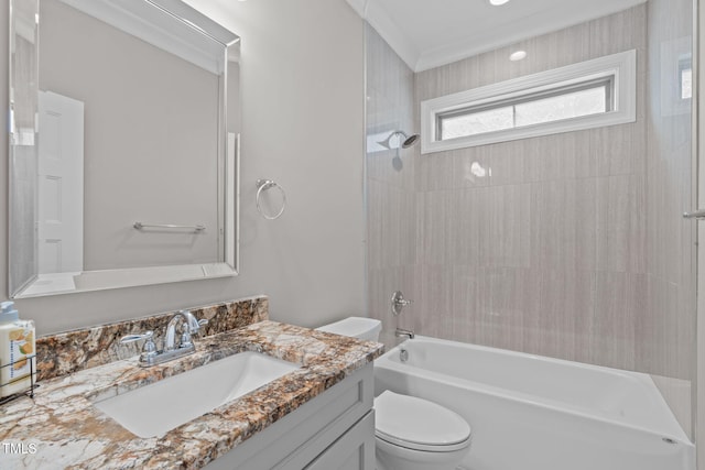 full bathroom with tiled shower / bath, vanity, and toilet