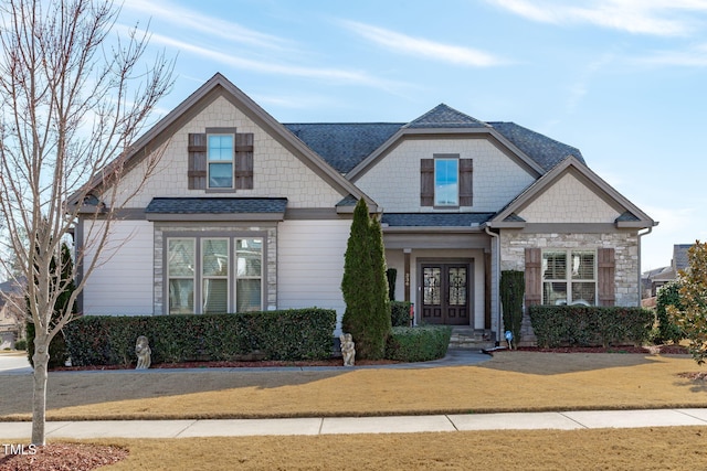 craftsman-style house with french doors