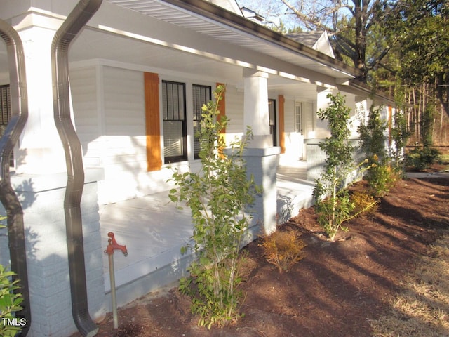 property entrance with a porch