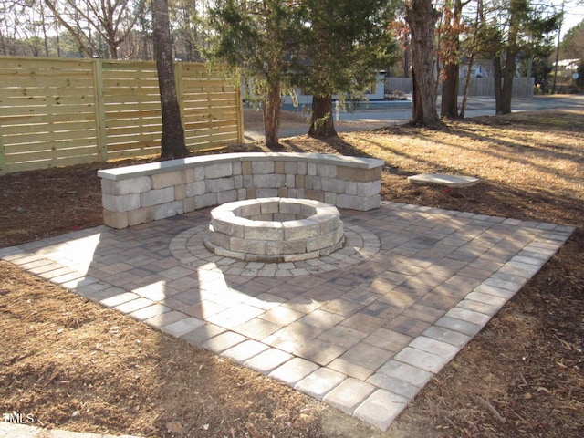 view of patio / terrace with a fire pit