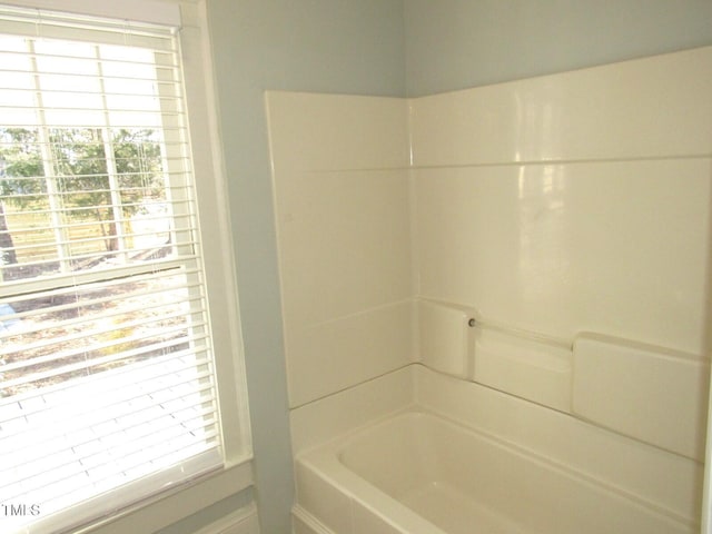 bathroom featuring bathing tub / shower combination