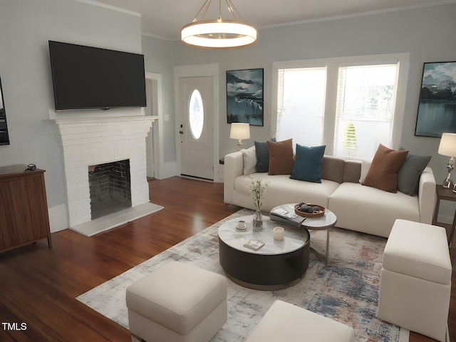 living room with crown molding, a brick fireplace, and hardwood / wood-style flooring