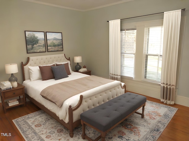 bedroom featuring ornamental molding and hardwood / wood-style floors