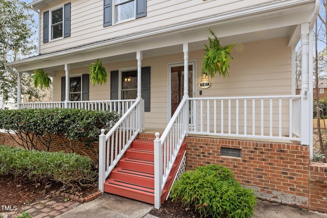 entrance to property with covered porch