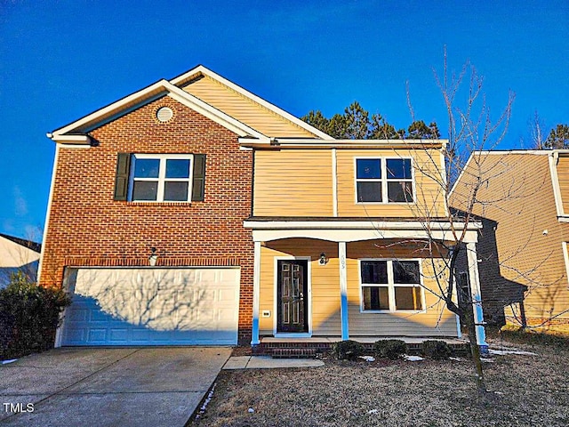 view of front of home with a garage