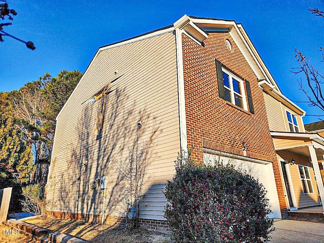 view of building exterior featuring a garage