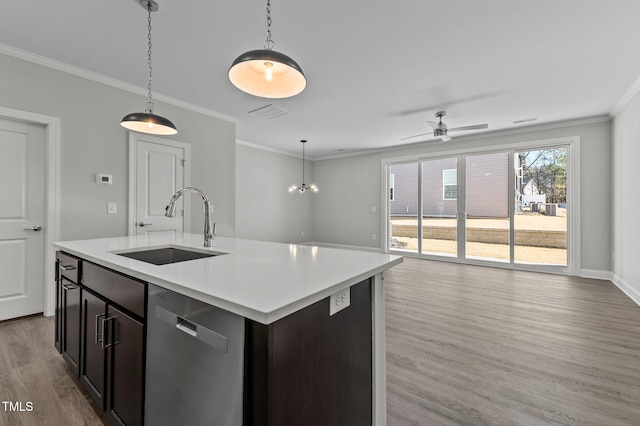 608 Marshskip Way, Rolesville, NC 27587 - kitchen featuring stainless steel dishwasher, a sink, crown molding, light wood finished floors, and open floor plan