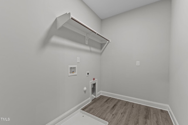 608 Marshskip Way, Rolesville, NC 27587 - washroom with hookup for a gas dryer, electric dryer hookup, hookup for a washing machine, wood finished floors, and baseboards