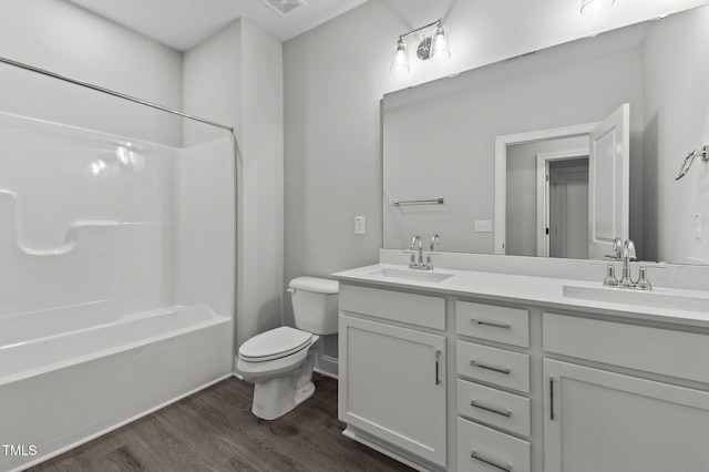 608 Marshskip Way, Rolesville, NC 27587 - bathroom with double vanity, wood finished floors, toilet, and  shower combination
