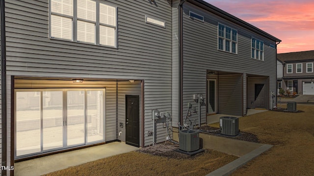 608 Marshskip Way, Rolesville, NC 27587 - back of property at dusk with central air condition unit