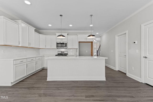 608 Marshskip Way, Rolesville, NC 27587 - kitchen with appliances with stainless steel finishes, crown molding, backsplash, white cabinetry, and light countertops