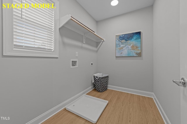 608 Marshskip Way, Rolesville, NC 27587 - laundry room featuring electric dryer hookup, light wood-style floors, washer hookup, and baseboards