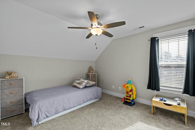 bedroom with lofted ceiling, carpet, and ceiling fan