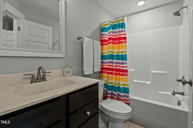 full bathroom with vanity, tile patterned flooring, toilet, and shower / bath combo with shower curtain