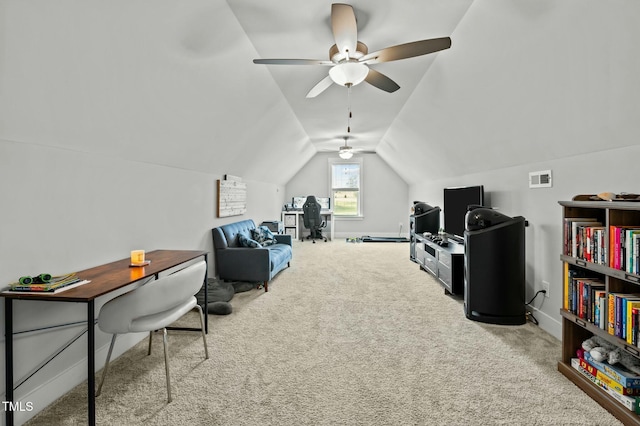 office with ceiling fan, lofted ceiling, and light carpet