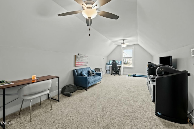 carpeted home office with vaulted ceiling