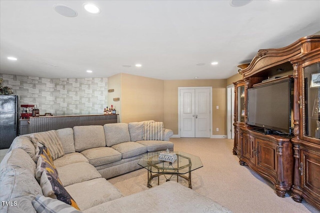 living room featuring light colored carpet