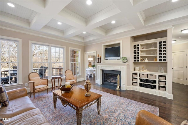 living room featuring dark hardwood / wood-style flooring, coffered ceiling, crown molding, and beam ceiling