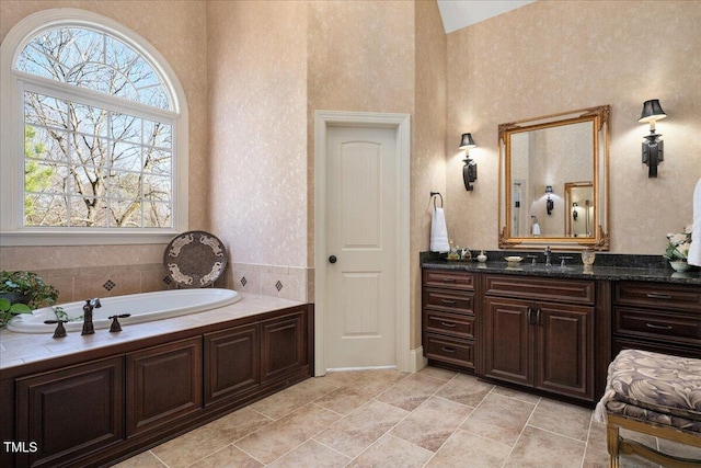 bathroom featuring vanity and a bathtub