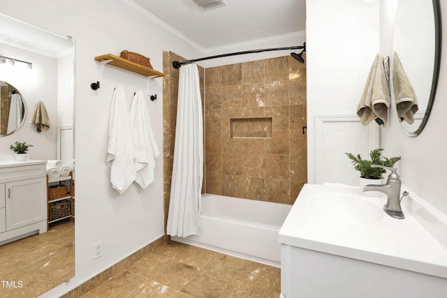 bathroom featuring crown molding, vanity, and shower / bath combo with shower curtain