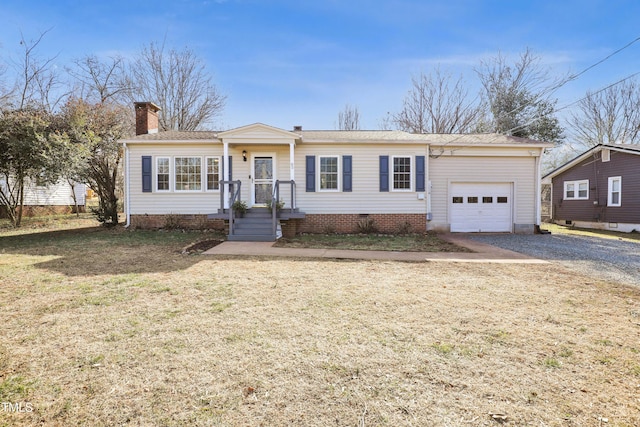 ranch-style house featuring a garage and a front yard