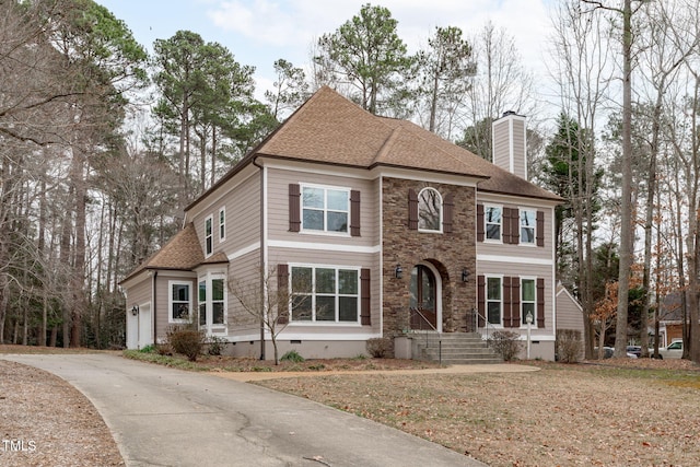 view of front of house with a garage