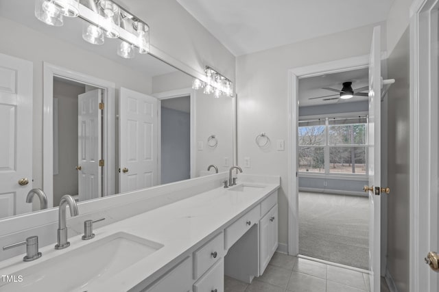 bathroom featuring vanity, tile patterned floors, and ceiling fan