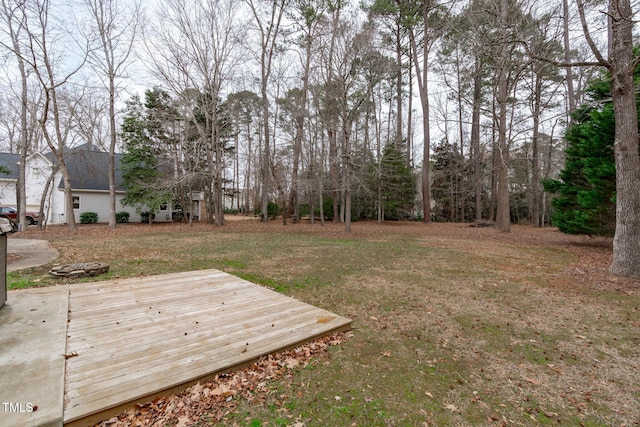 view of yard with a deck