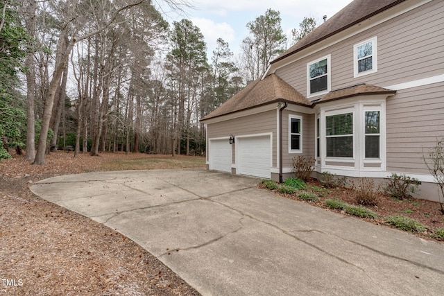 view of home's exterior featuring a garage