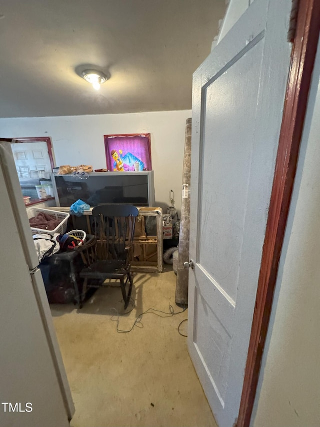 bedroom with white refrigerator