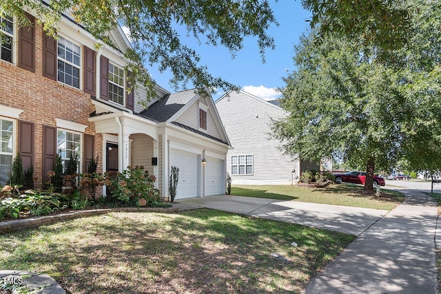 view of property exterior with a garage and a lawn