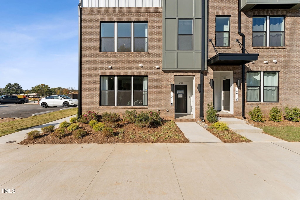 1253 S Blount St Unit 101, Raleigh, NC 27601 - view of townhome / multi-family property