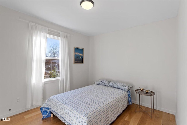 bedroom featuring hardwood / wood-style floors