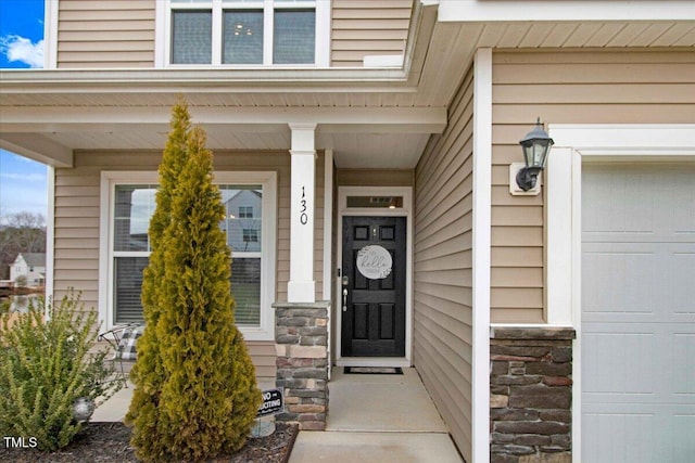 property entrance featuring a garage