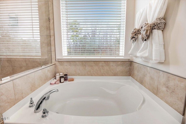 bathroom with a tub