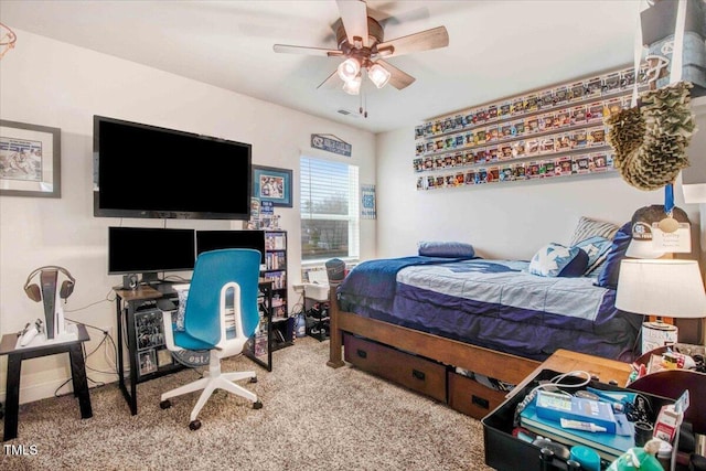 carpeted bedroom featuring ceiling fan