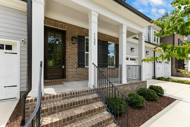 property entrance with a garage and a porch