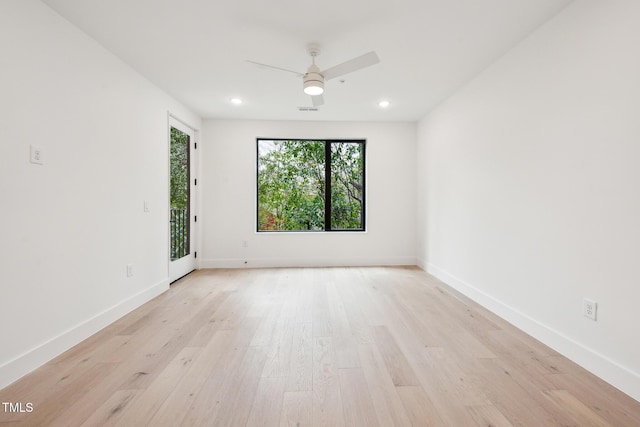 spare room with visible vents, baseboards, light wood finished floors, recessed lighting, and ceiling fan