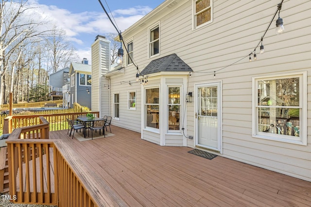 deck featuring outdoor dining space