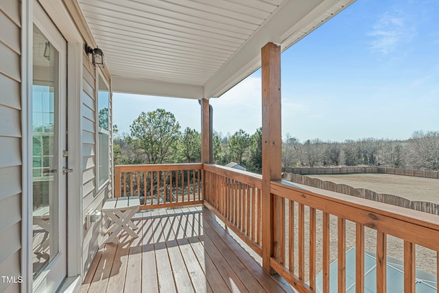 wooden deck featuring french doors