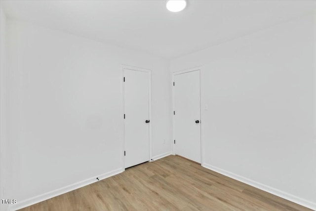 empty room featuring light hardwood / wood-style floors