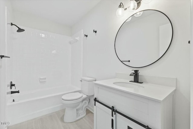 full bathroom featuring vanity, toilet, and washtub / shower combination