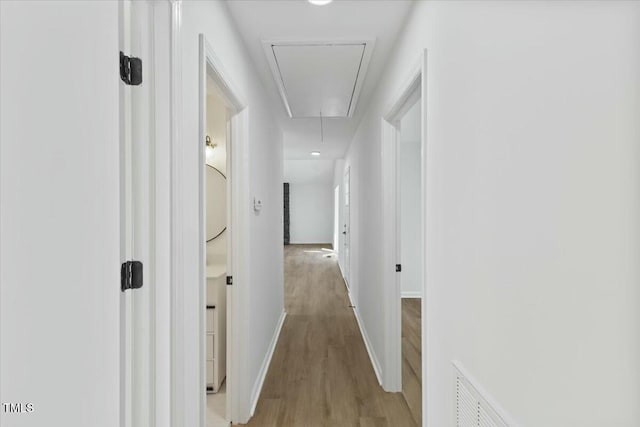 hallway featuring light wood-type flooring