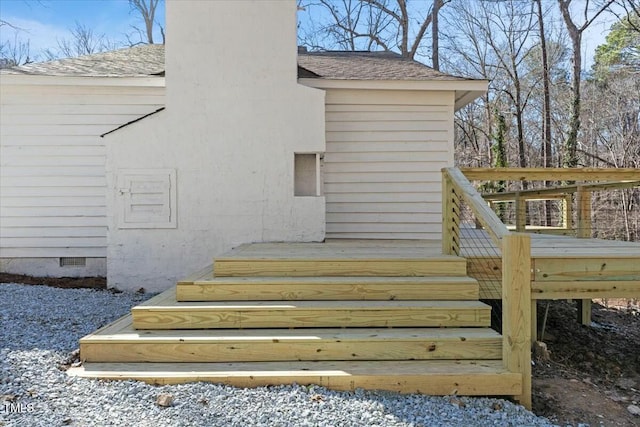 property entrance featuring a deck