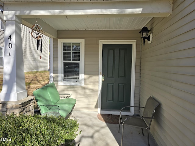 entrance to property with a porch