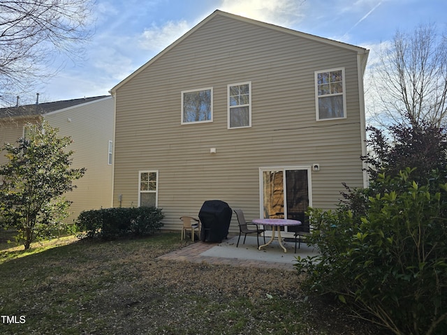 back of house featuring a patio