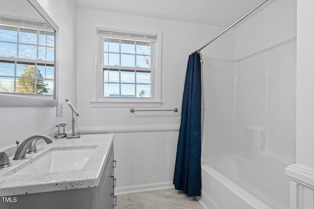 bathroom with vanity and shower / bathtub combination with curtain