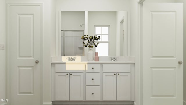 bathroom with vanity and walk in shower