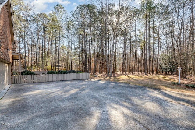 view of yard featuring a garage