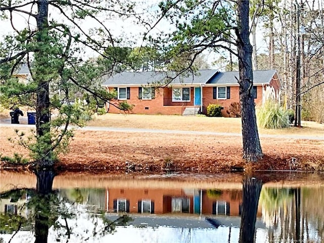 exterior space featuring a water view